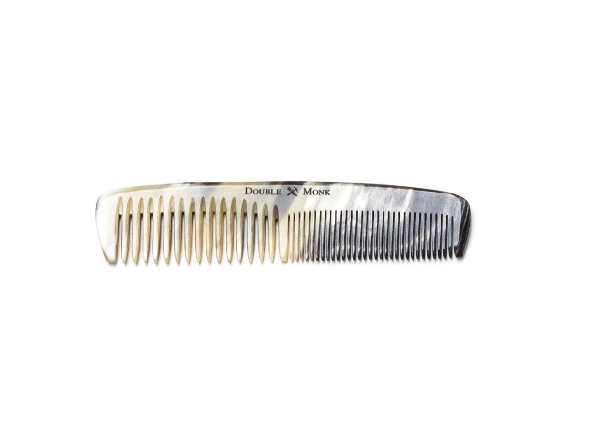 Abbeyhorn pocket sized horn hair comb with light brown and black variations