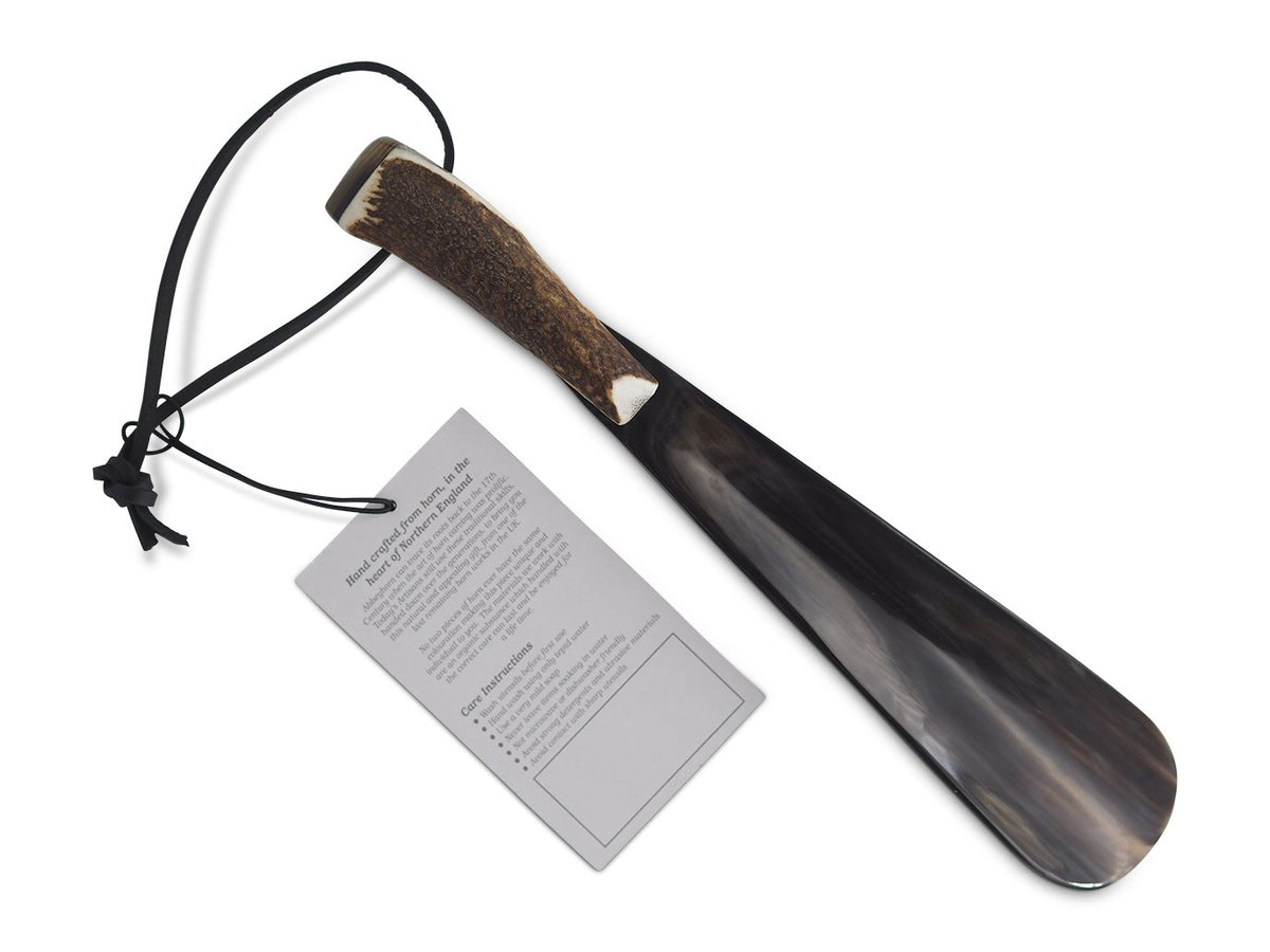 Front view of Abbeyhorn stag horn handle 9 inch shoe horn showing Double Monk logo