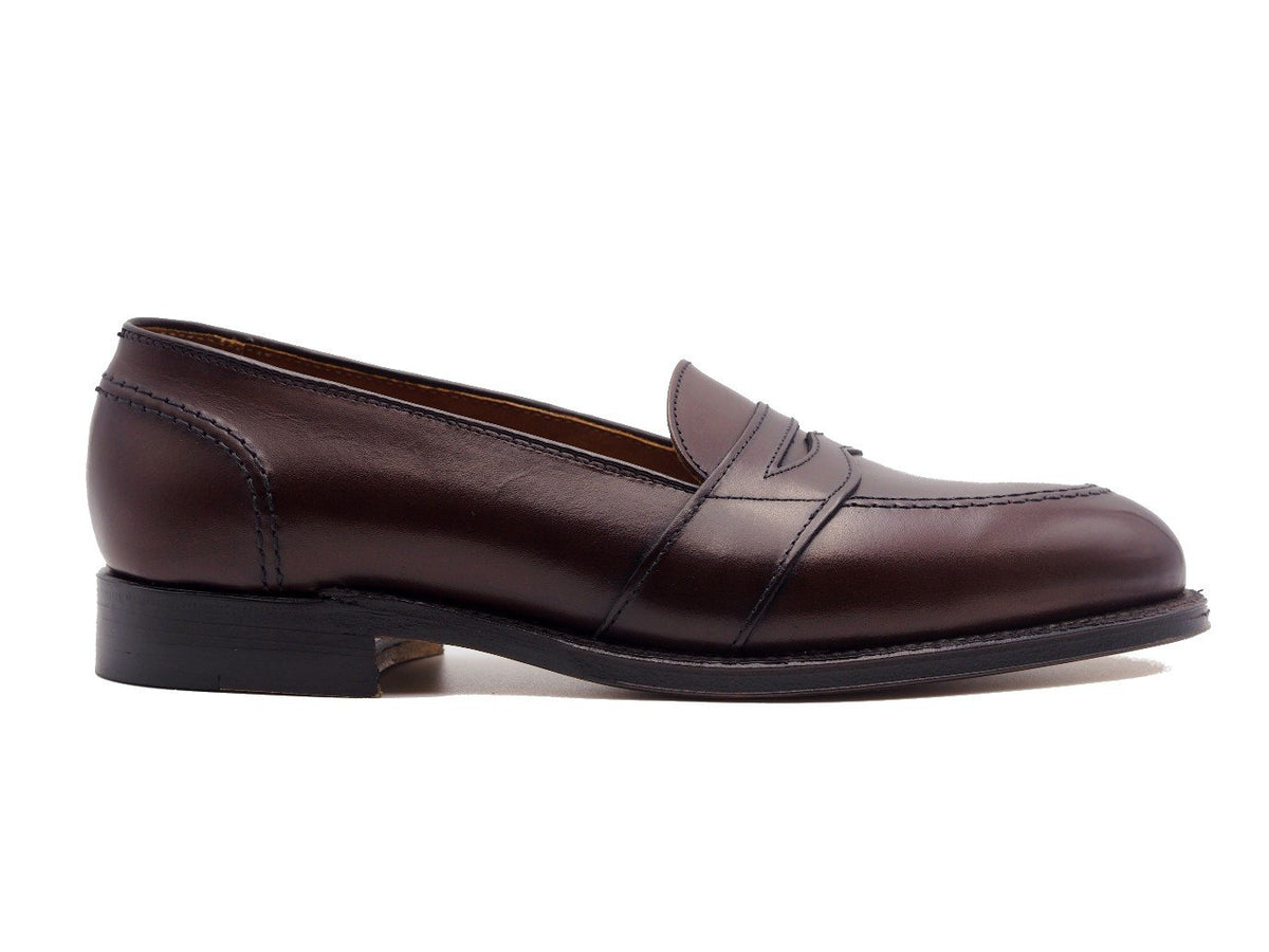 Side view of Alden full strap penny loafer in dark brown calf