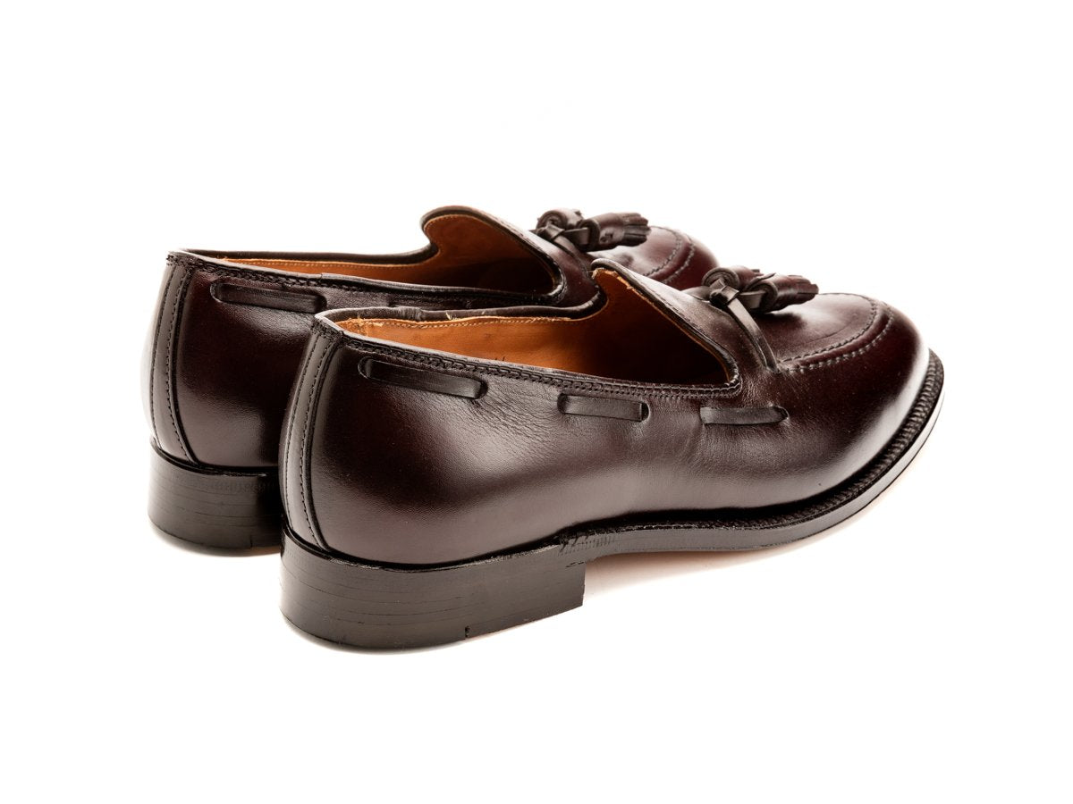 Back angle view of E width Alden tassel moccasin loafer in burgundy calf
