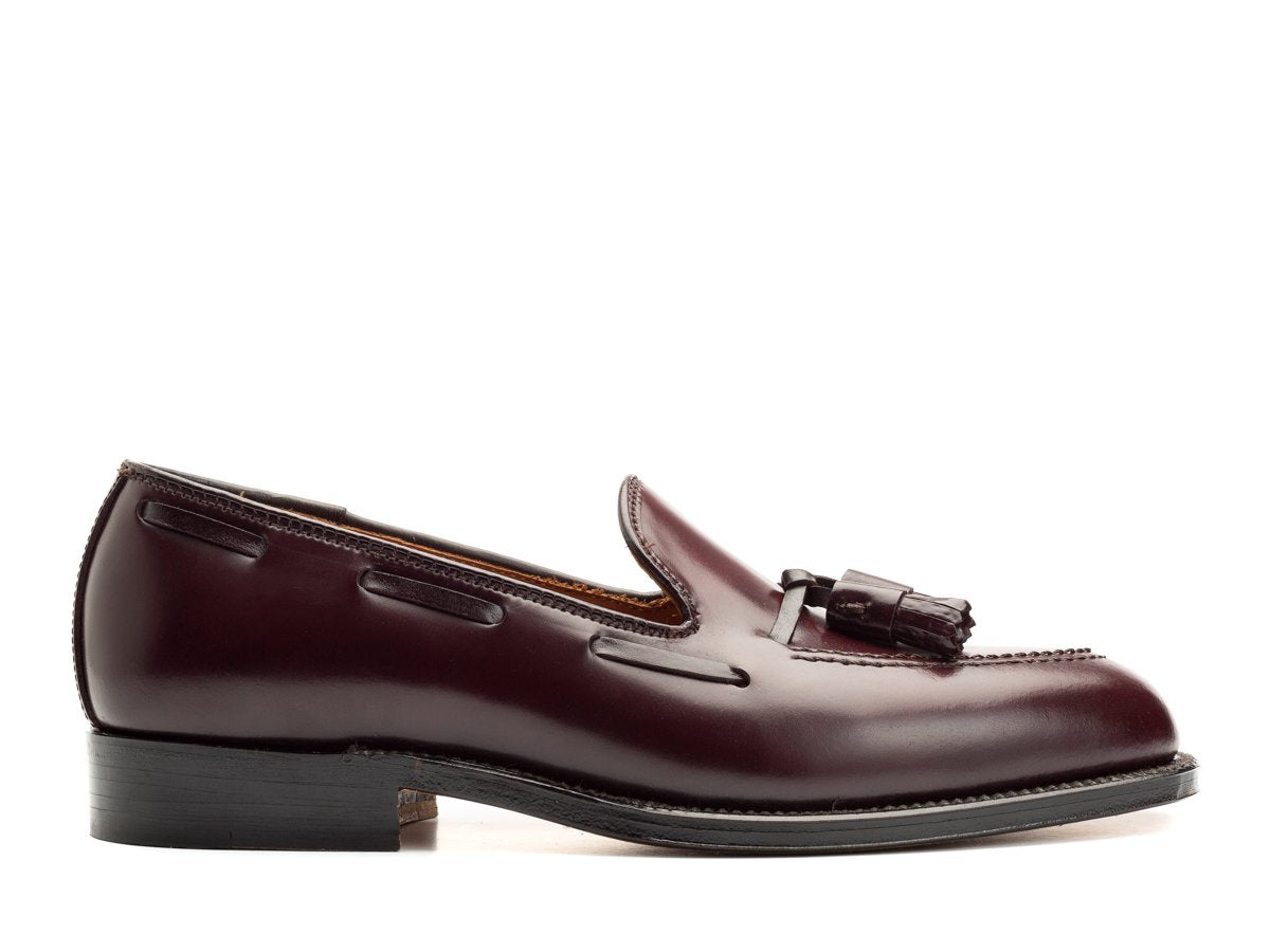 Side view of Alden tassel moccasin loafer in color 8 shell cordovan