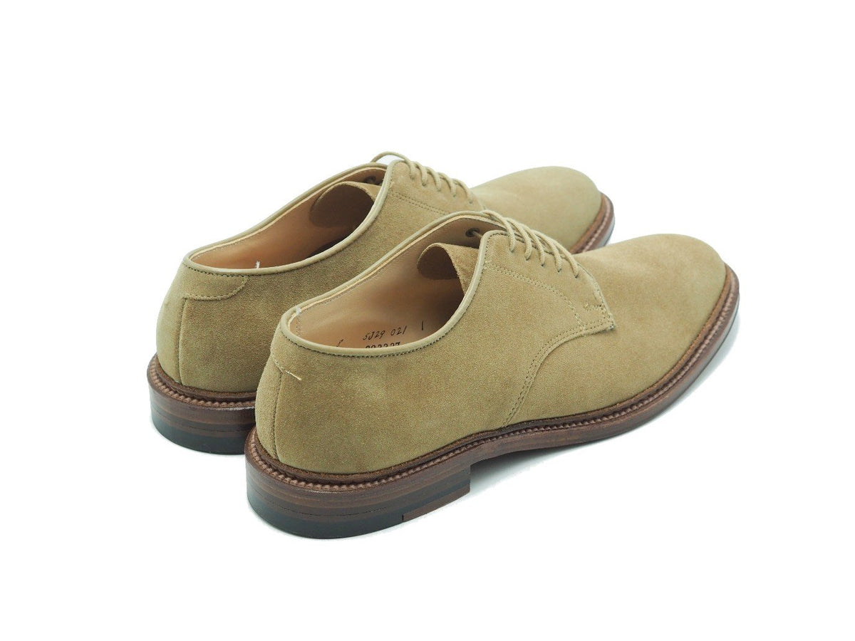 Back angle view of Alden unlined Dover plain toe blucher shoes in tan suede