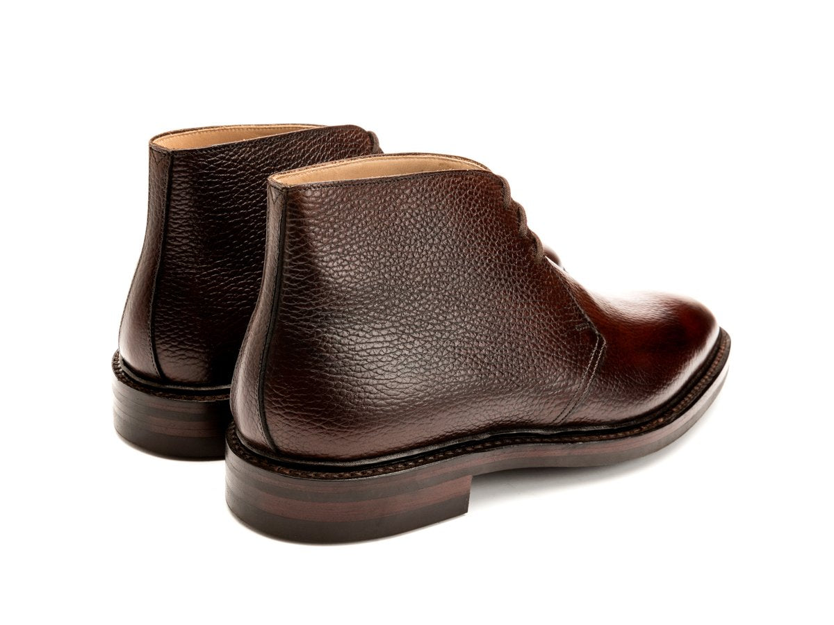Back angle view of Crockett & Jones Brecon chukka boots in dark brown country calf
