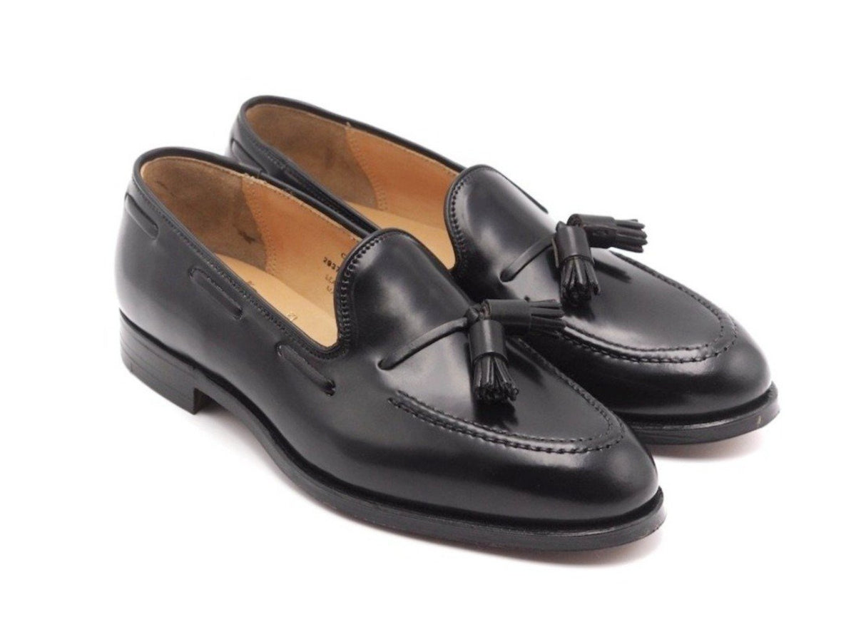 Front angle view of Crockett & Jones Cavendish tassel loafers in black shell cordovan