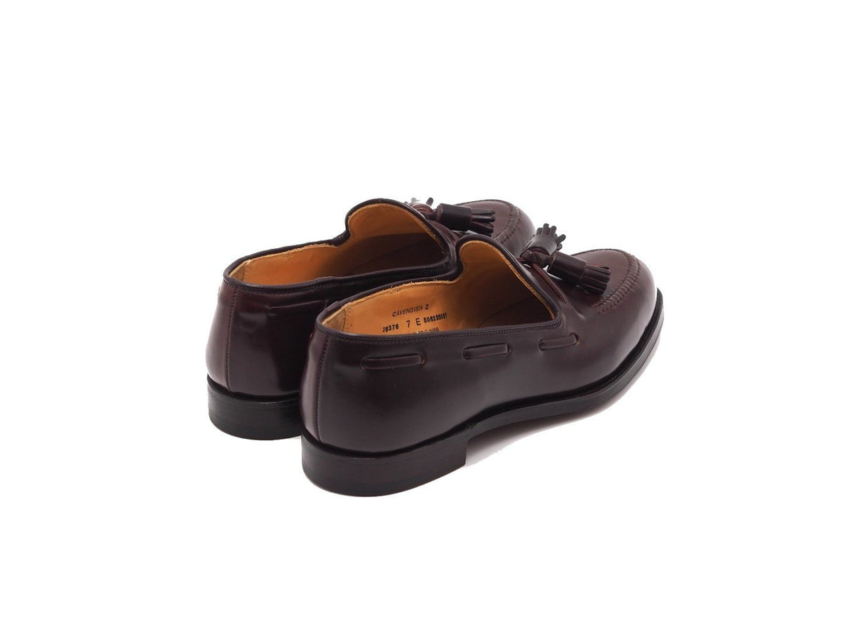Back angle view of Crockett & Jones Cavendish tassel loafers in burgundy shell cordovan