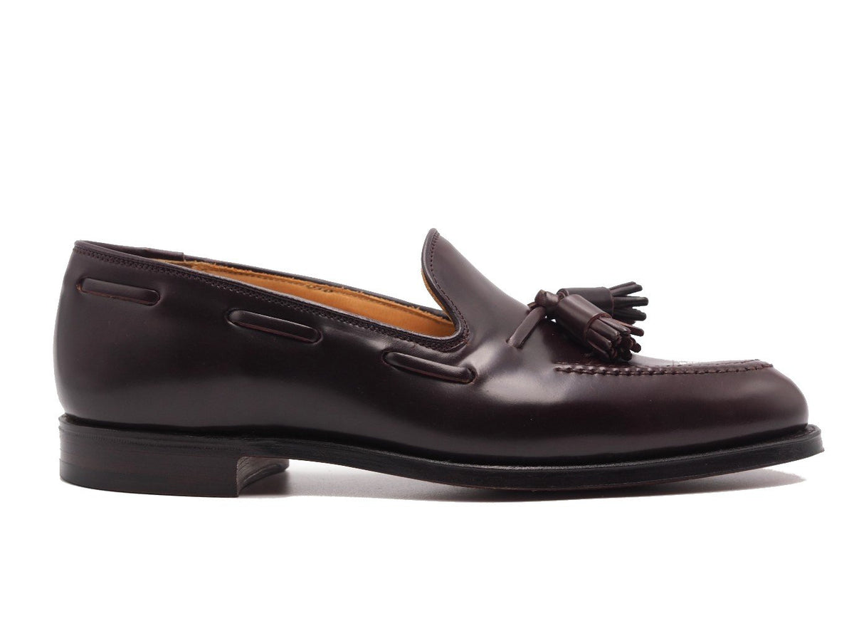 Side view of Crockett & Jones Cavendish tassel loafers in burgundy shell cordovan