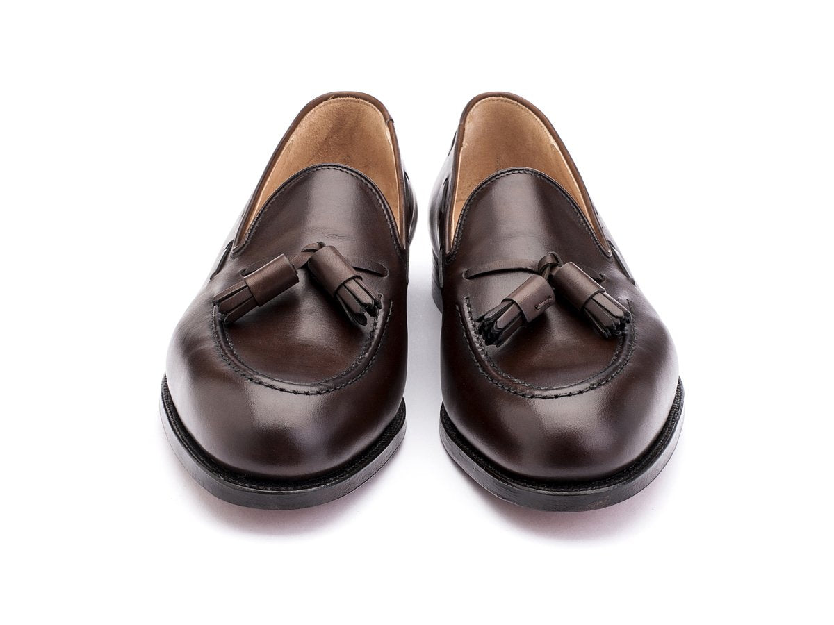Front view of Crockett & Jones Cavendish tassel loafers in dark brown burnished calf