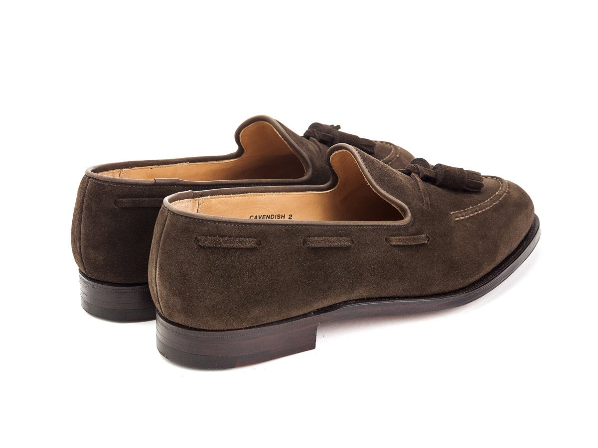 Back angle view of Crockett & Jones Cavendish tassel loafers in dark brown suede