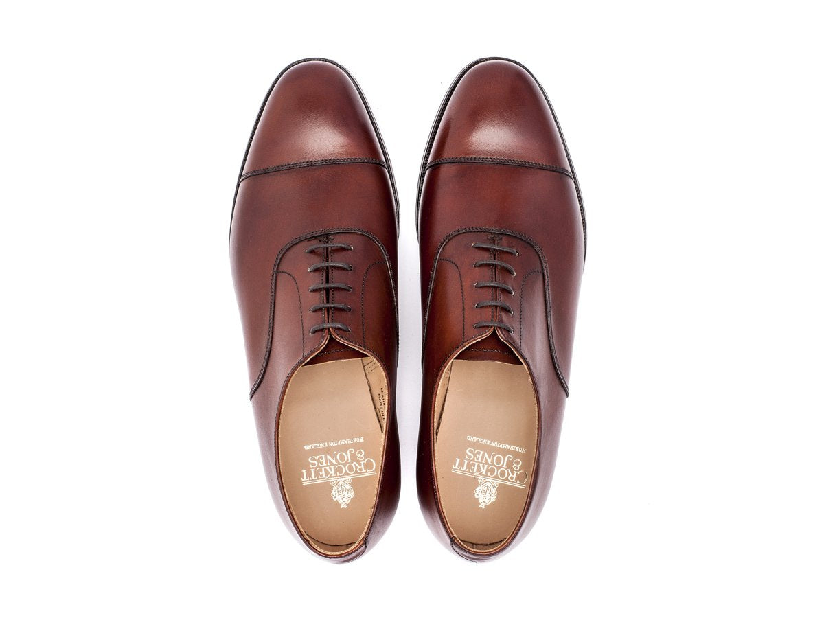Top view of F width Crockett & Jones Connaught plain captoe oxford shoes in chestnut burnished calf