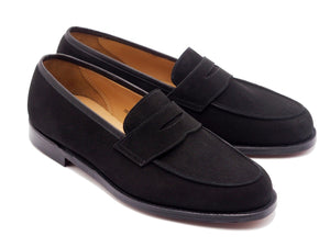 Front angle view of Crockett & Jones Kirribilli penny loafers in black suede