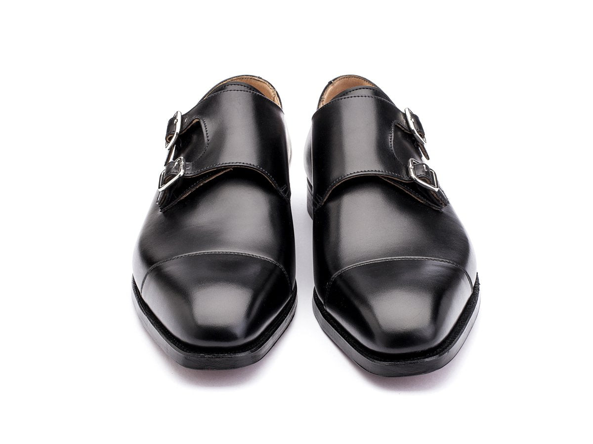 Front view of Crockett & Jones Lowndes captoe double monk strap shoes in black calf
