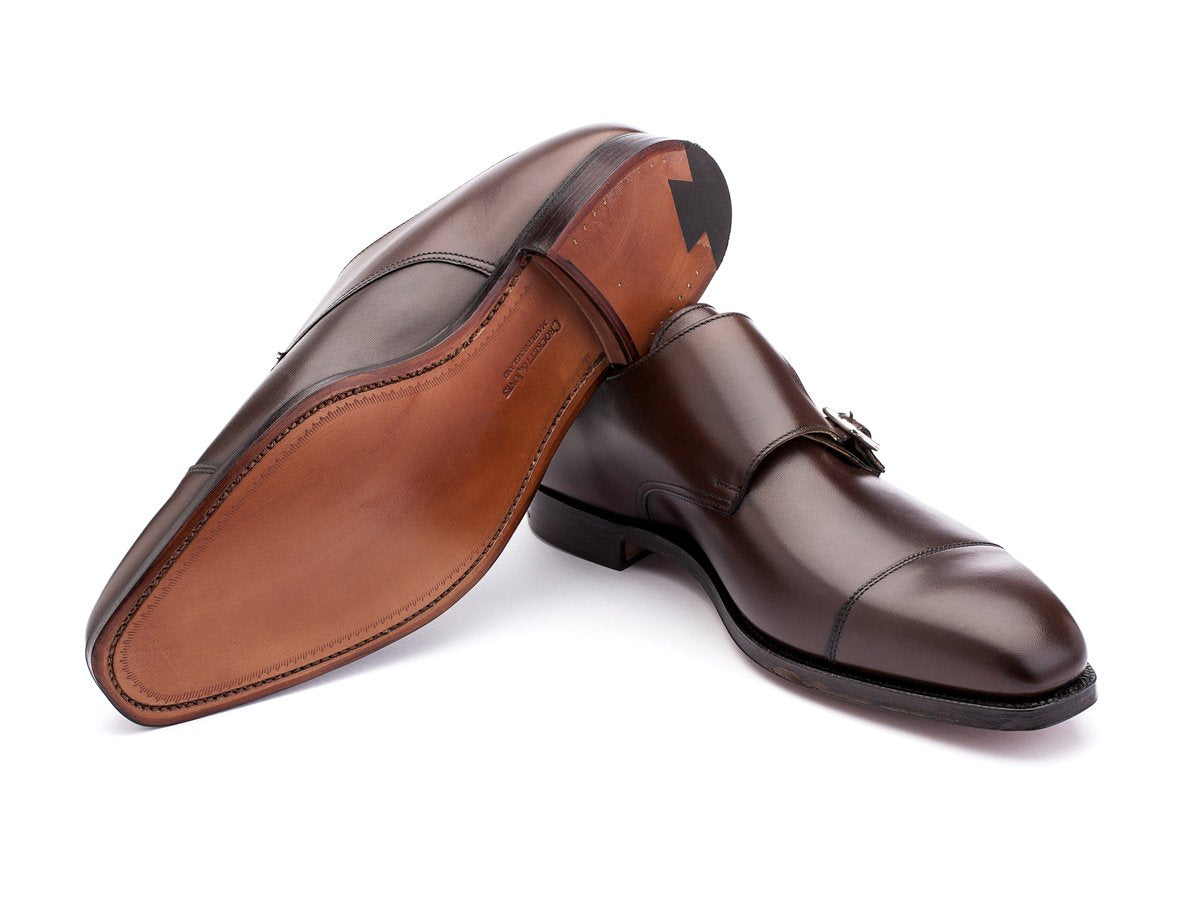Leather sole of Crockett & Jones Lowndes captoe double monk strap shoes in dark brown burnished calf