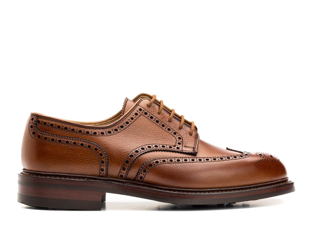 Side view of Crockett & Jones Pembroke wingtip full brogue derby shoes in tan scotch grain calf