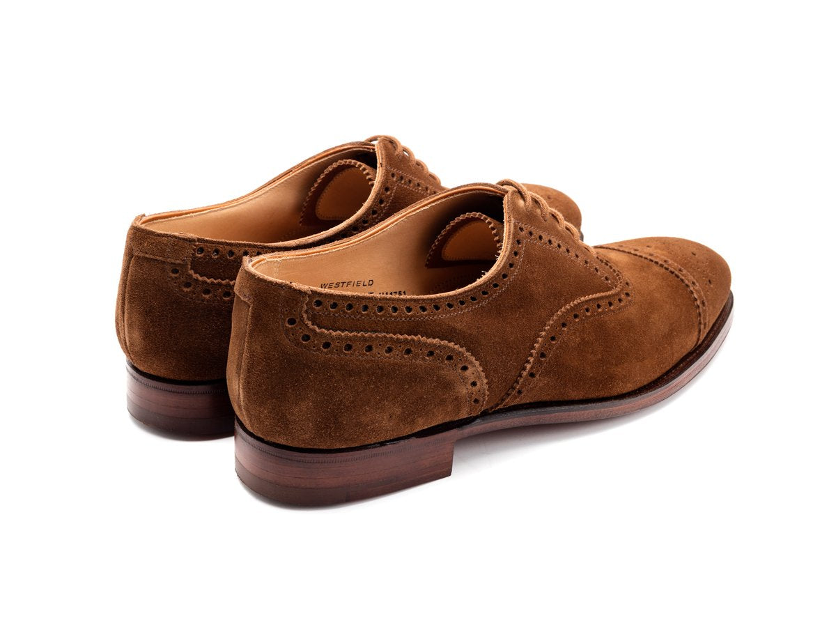 Back angle view of Crockett & Jones Westfield half brogue oxford shoes in tobacco suede