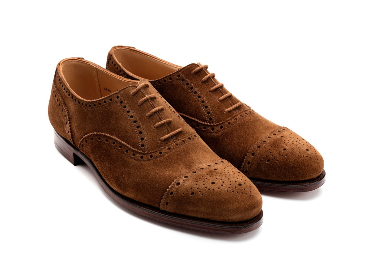 Front angle view of Crockett & Jones Westfield half brogue oxford shoes in tobacco suede