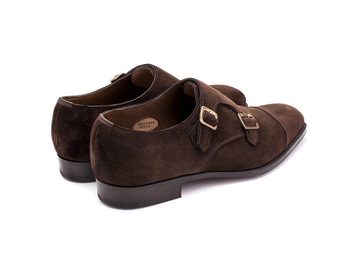 Back angle view of F width Edward Green Westminster plain captoe double monk strap shoes in mink suede