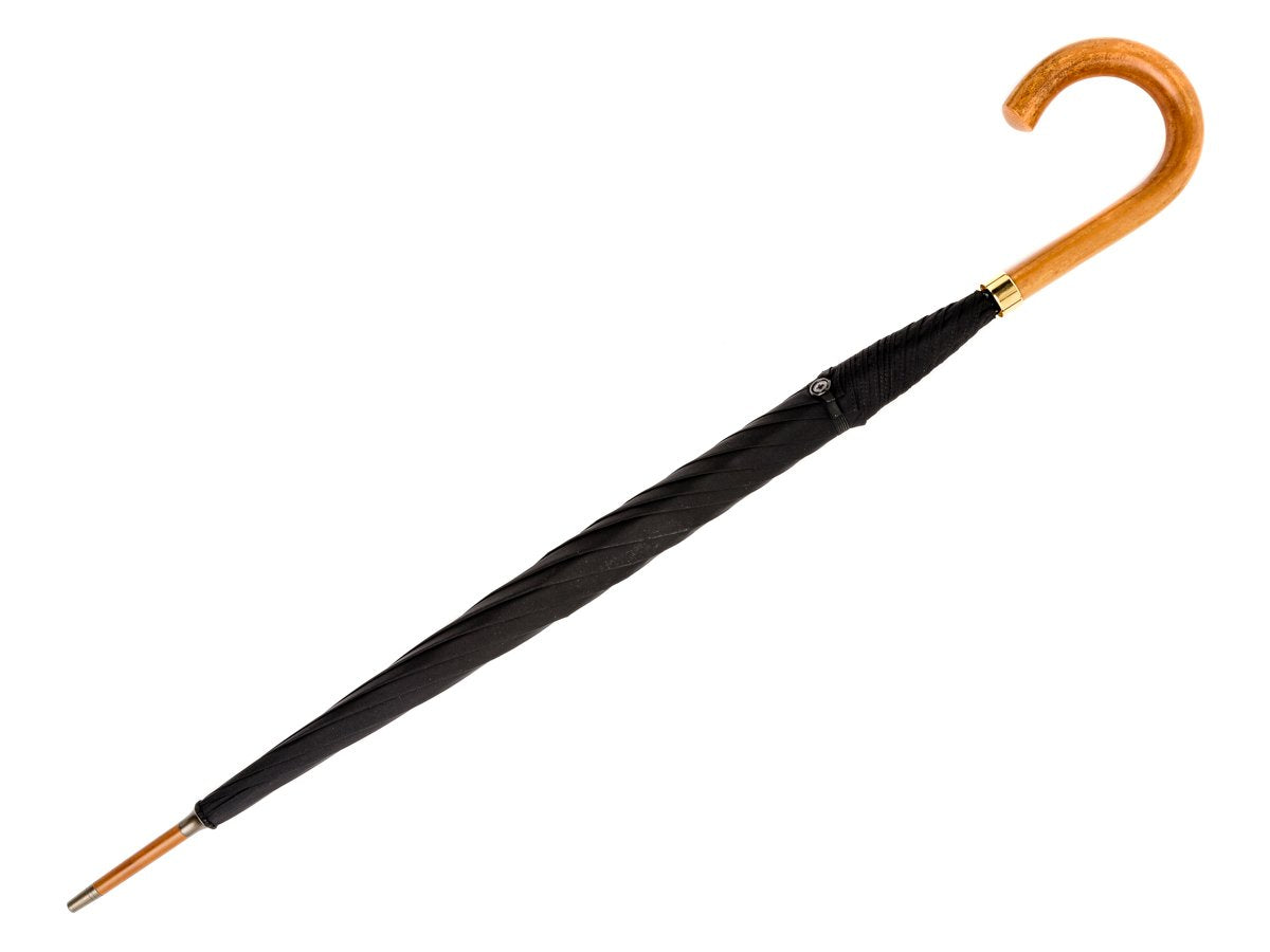 Full length view of malacca handle foldable tube Fox Umbrella with black canopy