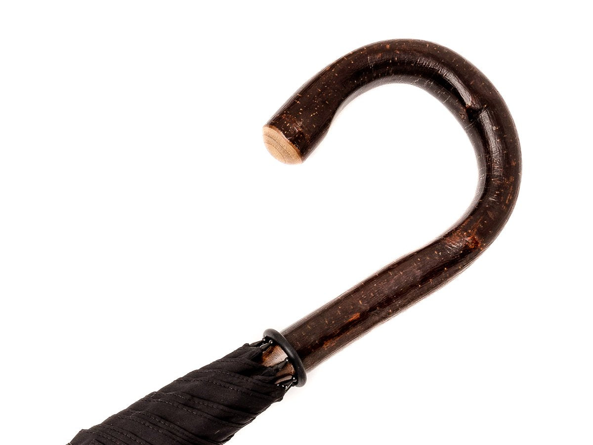 Handle of solid bark chestnut Fox Umbrella with black canopy