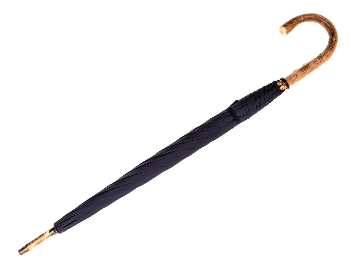 Full length view of solid congo Fox Umbrella with navy canopy