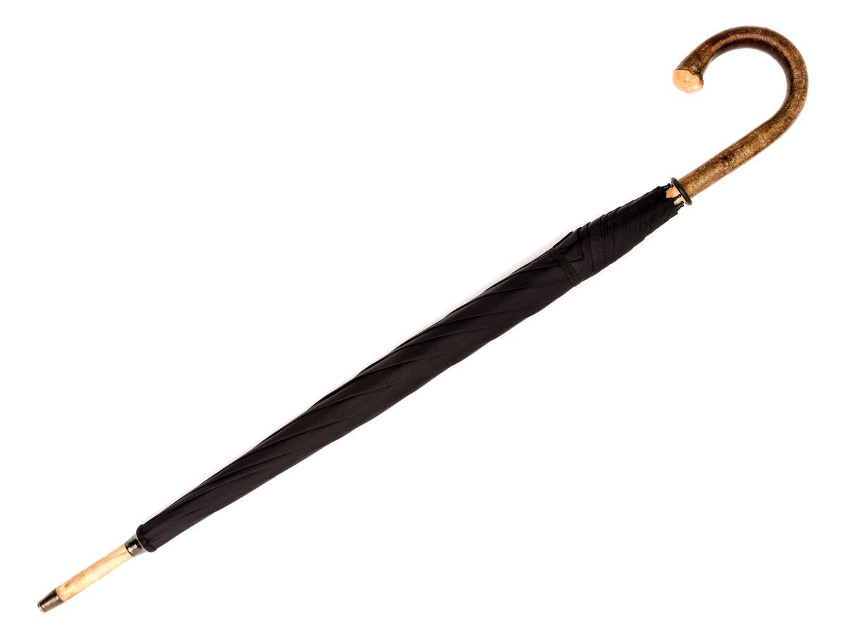 Full length view of solid hazel crook Fox Umbrella with black canopy