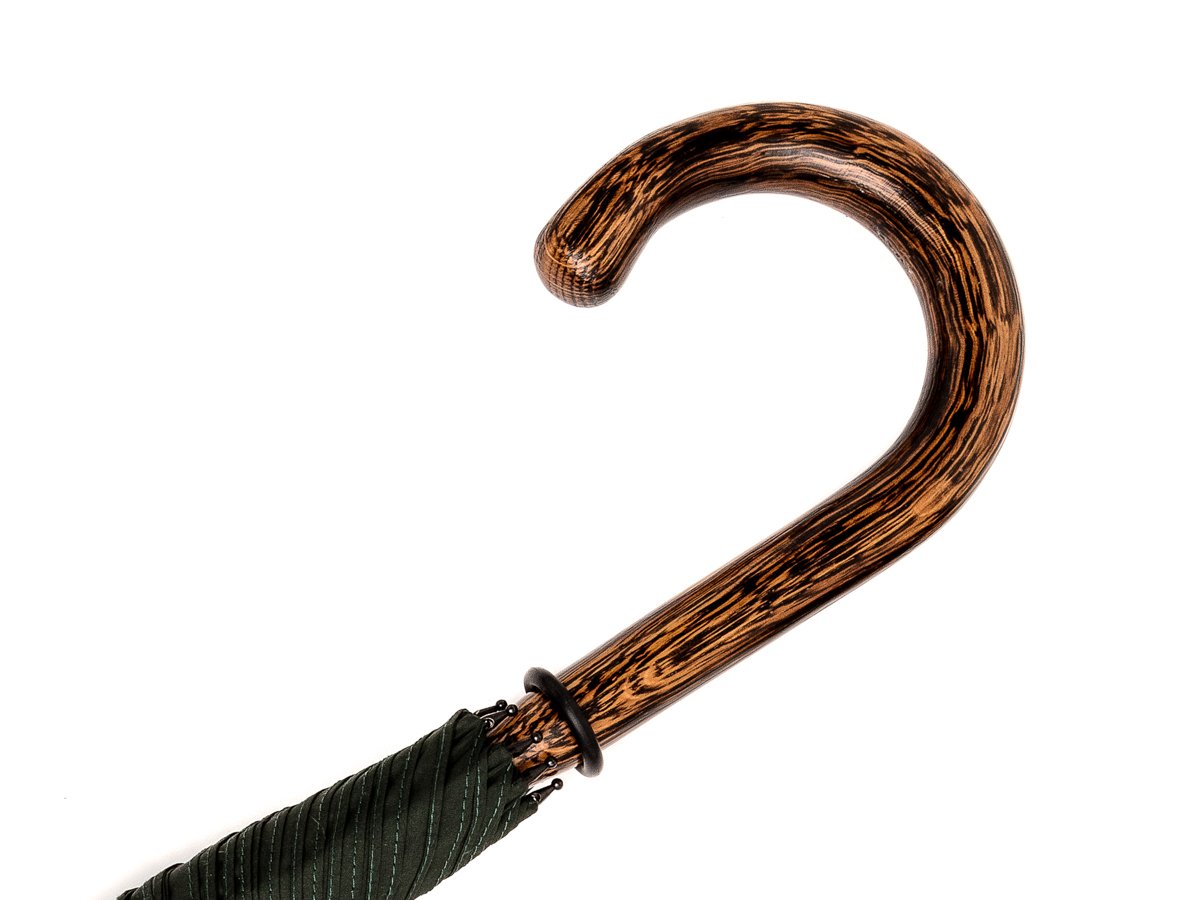 Handle of solid oak Fox Umbrella with dark green canopy