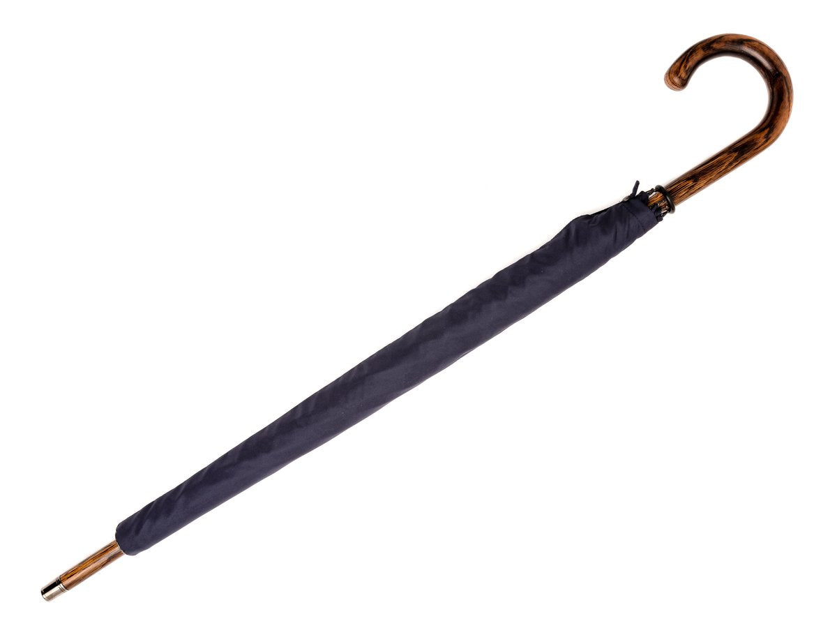 Canopy cover of solid oak Fox Umbrella with navy canopy