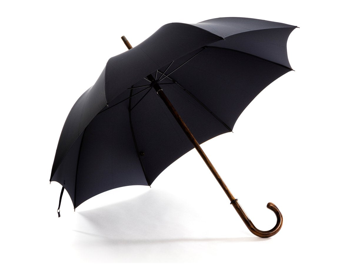 Opened solid oak Fox Umbrella with navy canopy