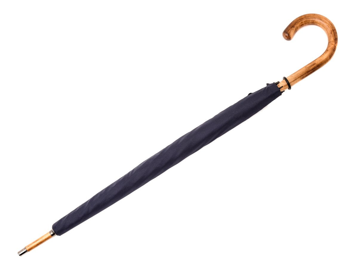 Canopy cover of solid scorched maple Fox Umbrella with navy canopy