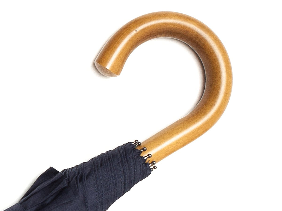Malacca handle of telescopic Fox Umbrella with navy canopy