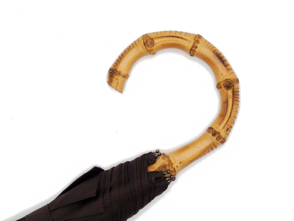Whangee handle of telescopic Fox Umbrella with brown canopy