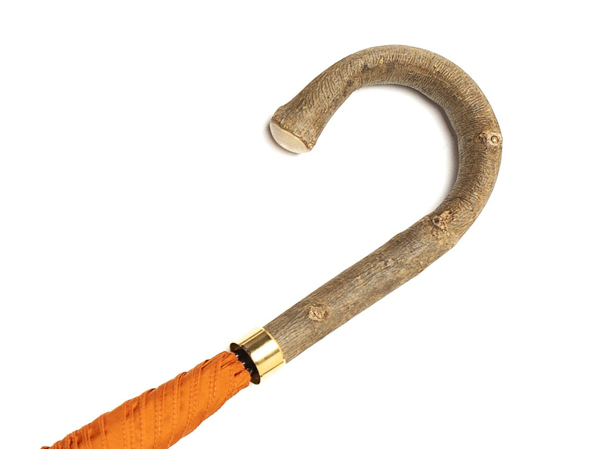 Ash handle of tube Fox Umbrella with orange canopy