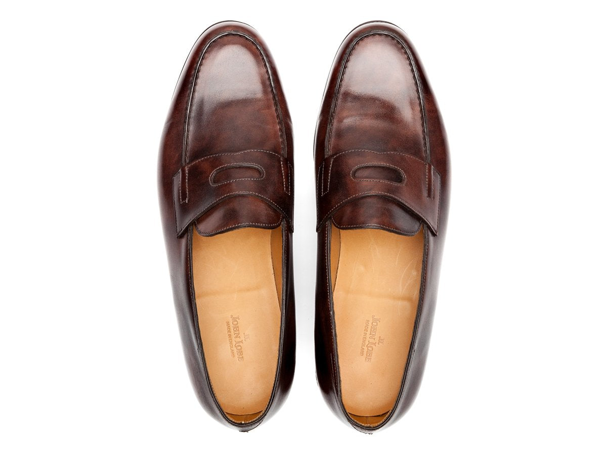 Top view of John Lobb Lopez penny loafers in dark brown museum calf