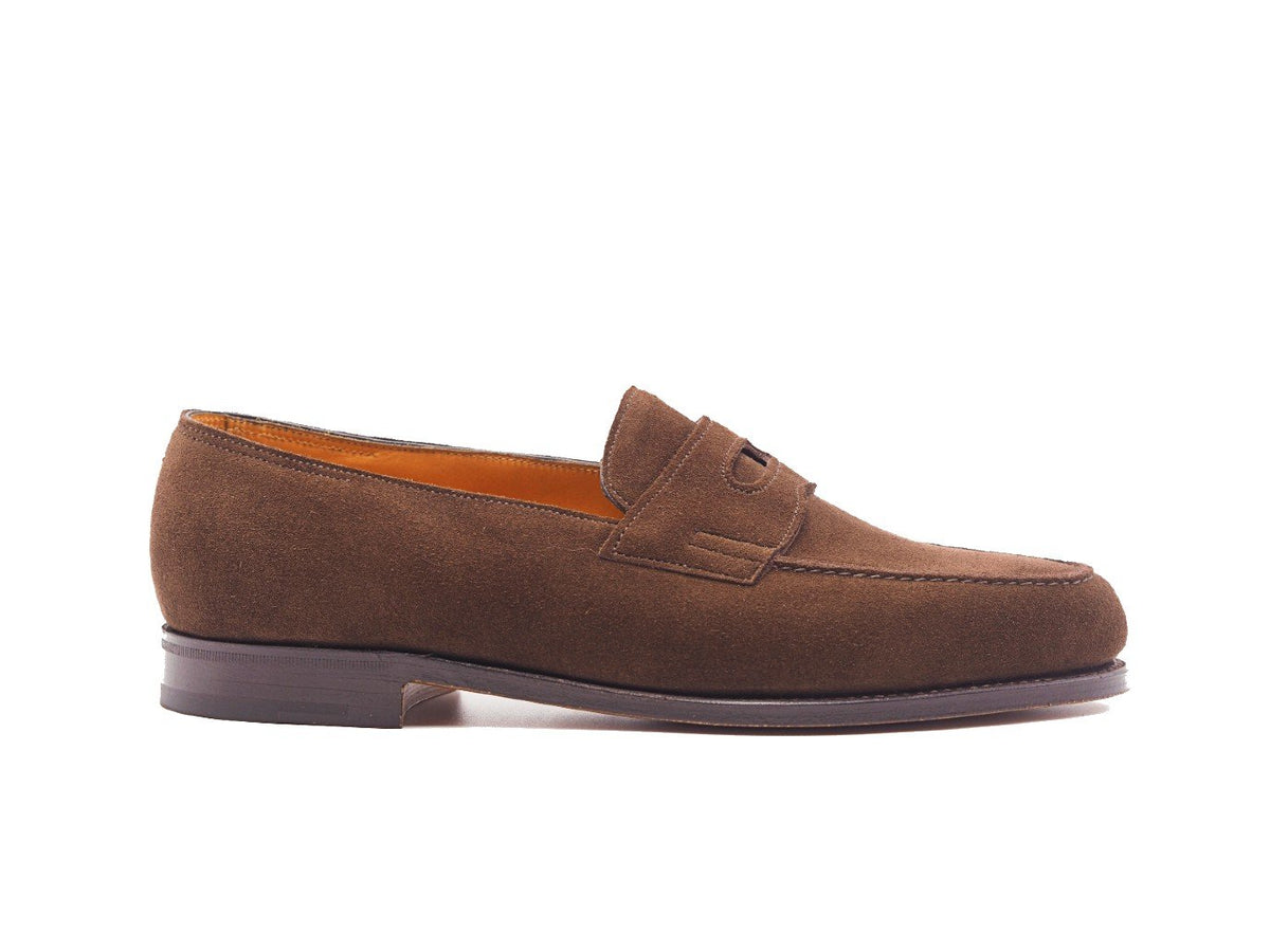 Side view of John Lobb Lopez penny loafers in dark brown suede