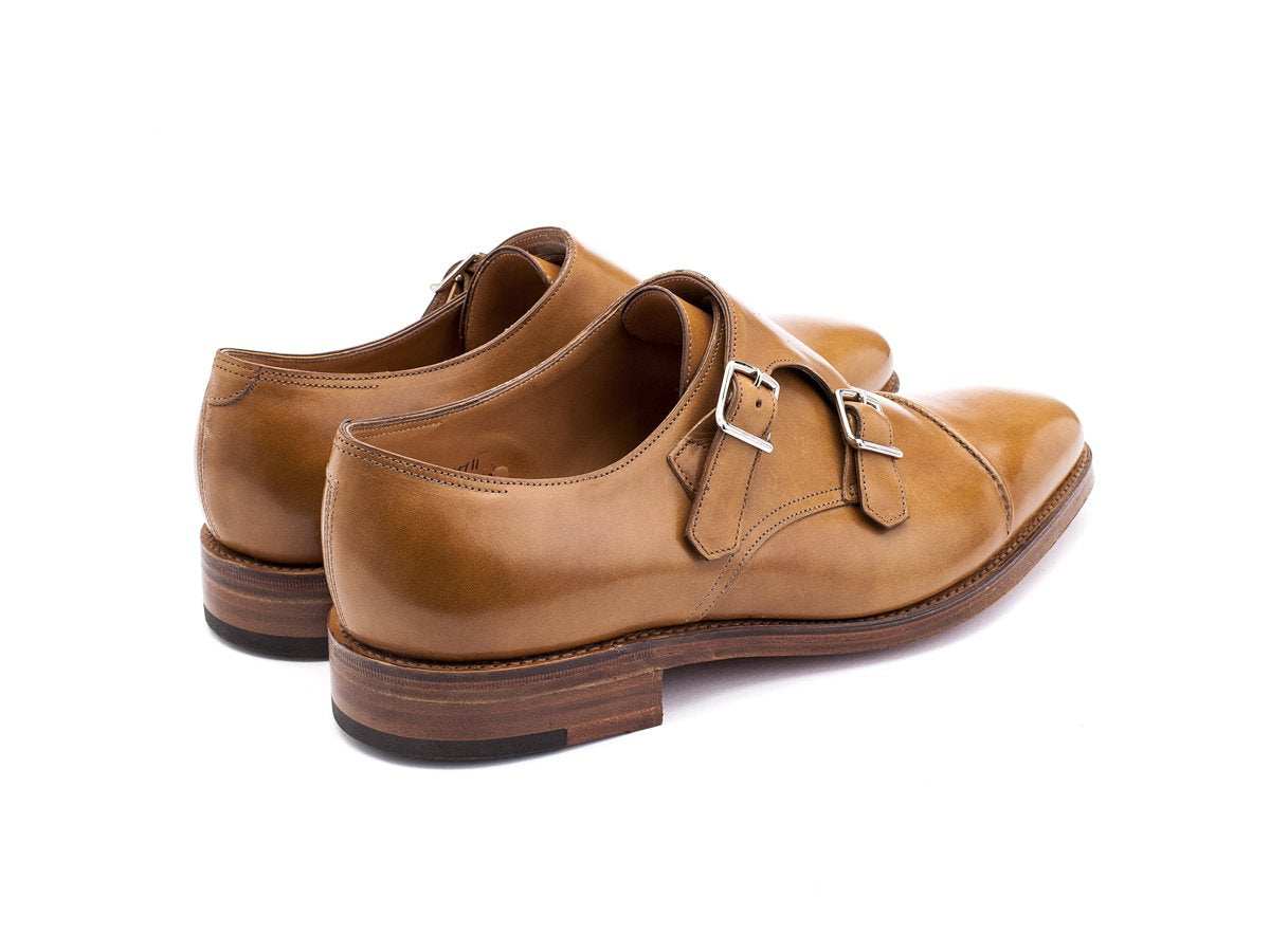 Back angle view of EE width John Lobb William II captoe double monk strap shoes in ardilla misty calf