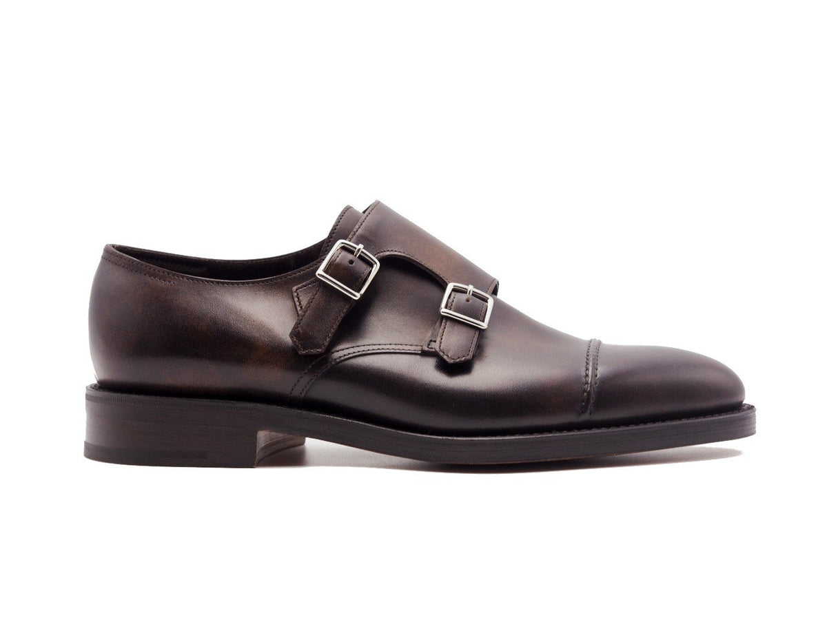 Side view of John Lobb William II captoe double monk strap shoes in dark brown museum calf