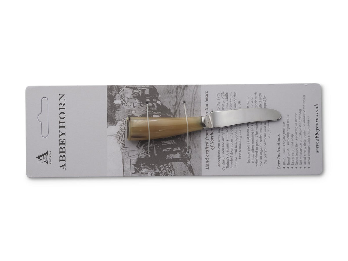Abbeyhorn butter knife with light coloured handle in packaging