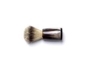 Side view of Abbeyhorn super badger shaving brush with dark coloured oxhorn handle