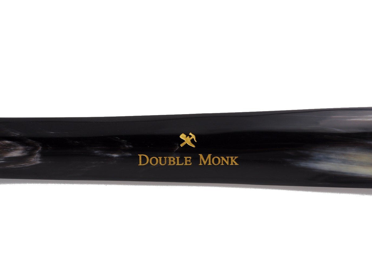 Close up of Double Monk logo on Abbeyhorn shoe horn