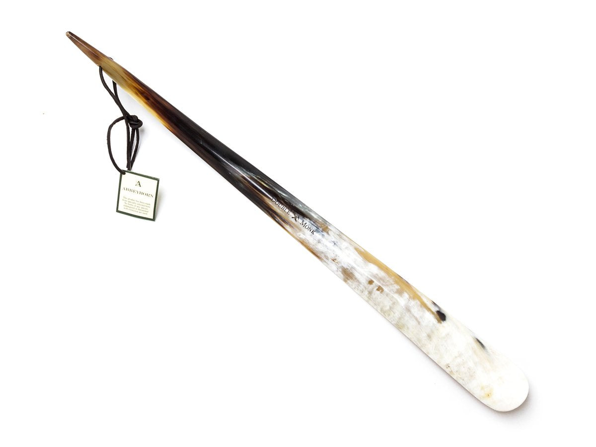 Back view of Abbeyhorn 24 inch tip end shoe horn with dark brown and white variations