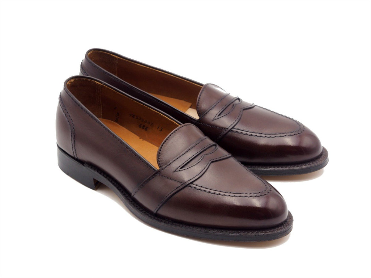 Front angle view of Alden full strap penny loafer in dark brown calf