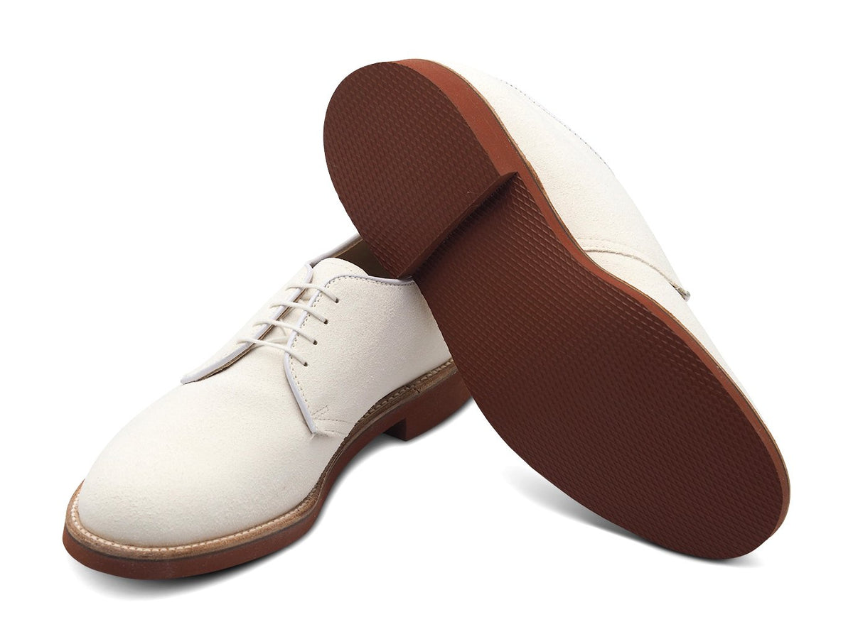 Rubber sole of Alden plain toe blucher shoes in white buck