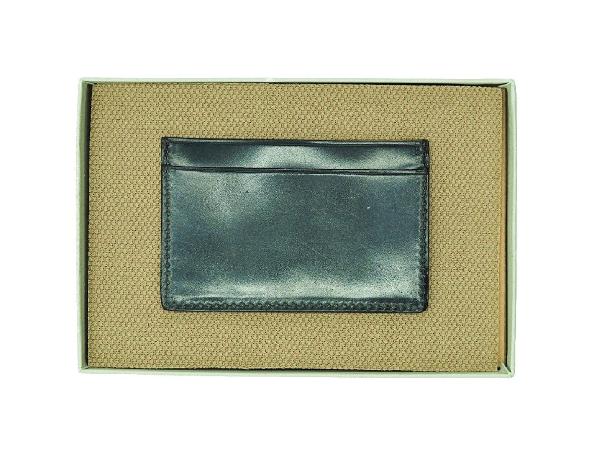 Back view of Alden slim credit card case in black shell cordovan inside box