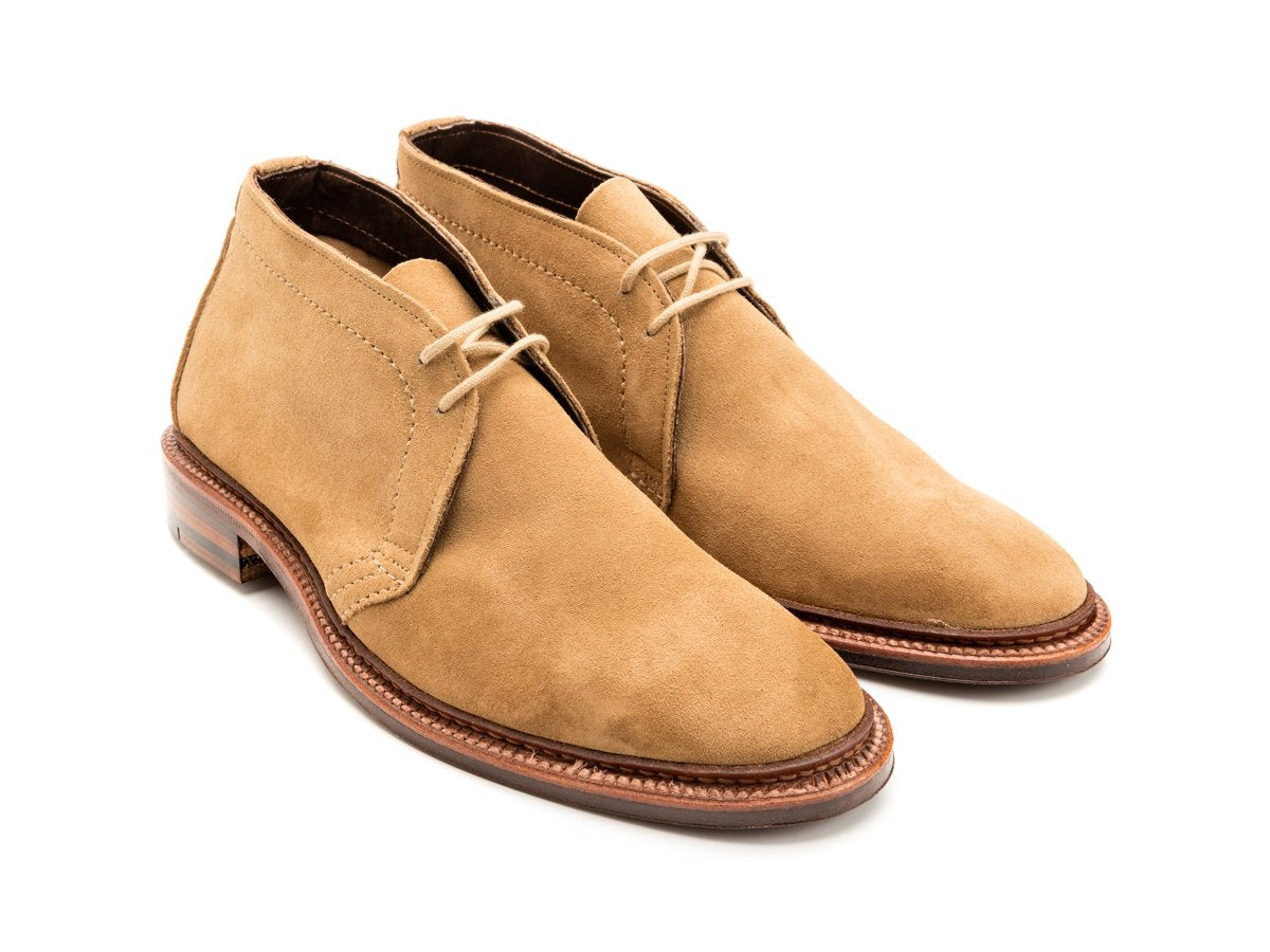 Front angle view of E width Alden unlined chukka boot in tan suede