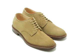Front angle view of Alden unlined Dover plain toe blucher shoes in tan suede