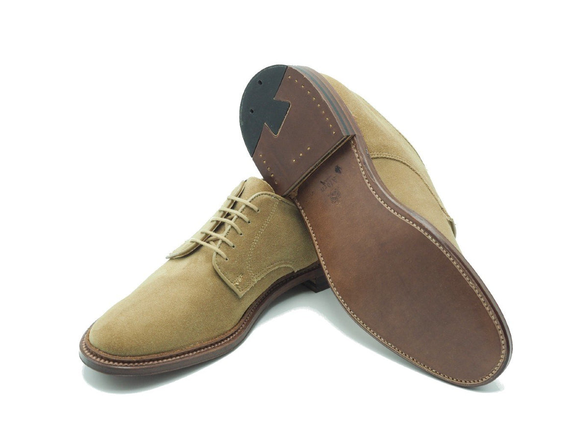 Leather sole of Alden unlined Dover plain toe blucher shoes in tan suede