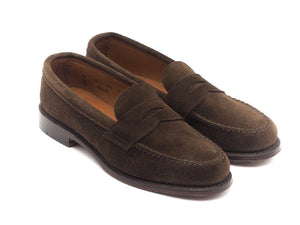 Front angle view of Alden unlined leisure handsewn penny loafer in dark brown suede