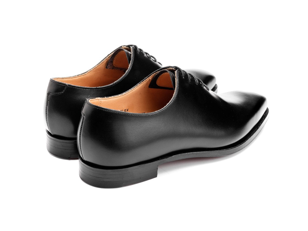 Back angle view of Crockett & Jones Alex wholecut oxford shoes in black calf