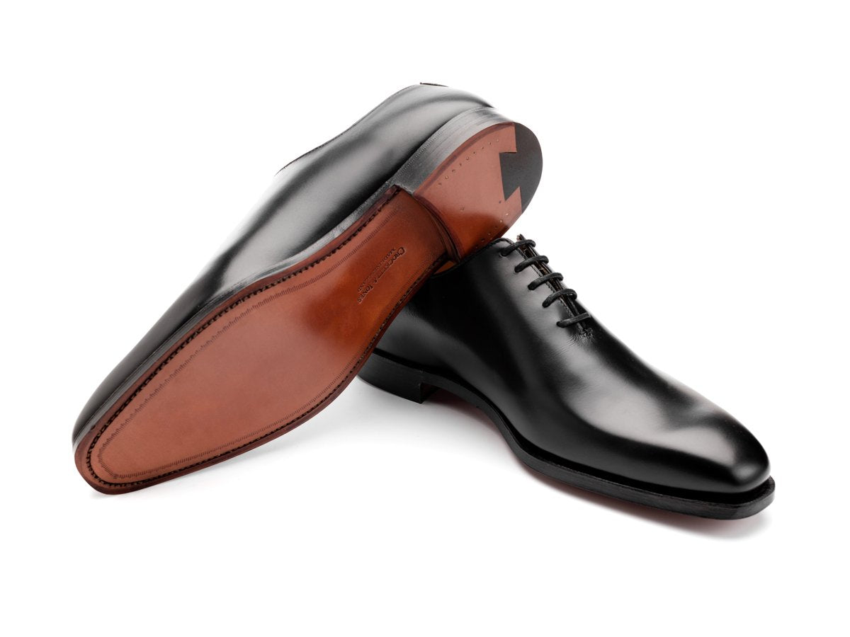 Leather sole of Crockett & Jones Alex wholecut oxford shoes in black calf