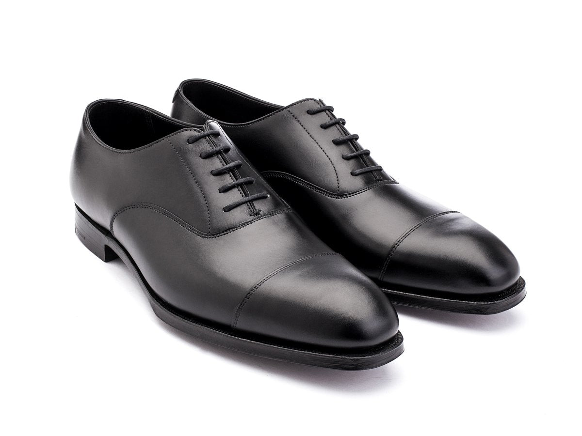 Front angle view of Crockett & Jones Audley plain captoe oxford shoes in black calf