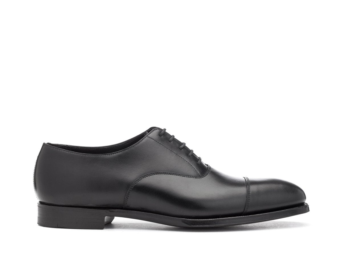 Side view of Crockett & Jones Audley plain captoe oxford shoes in black calf